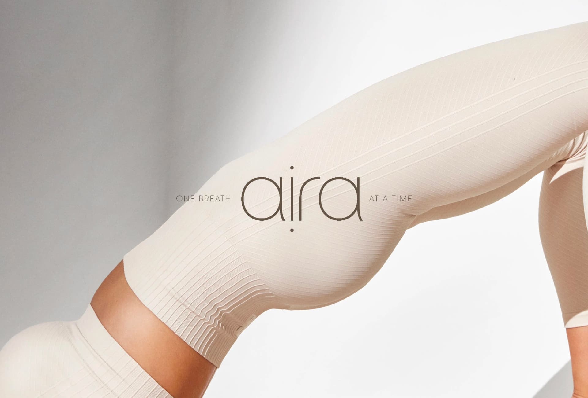 AIRA One breath at a time sobre una fotografía de pilates